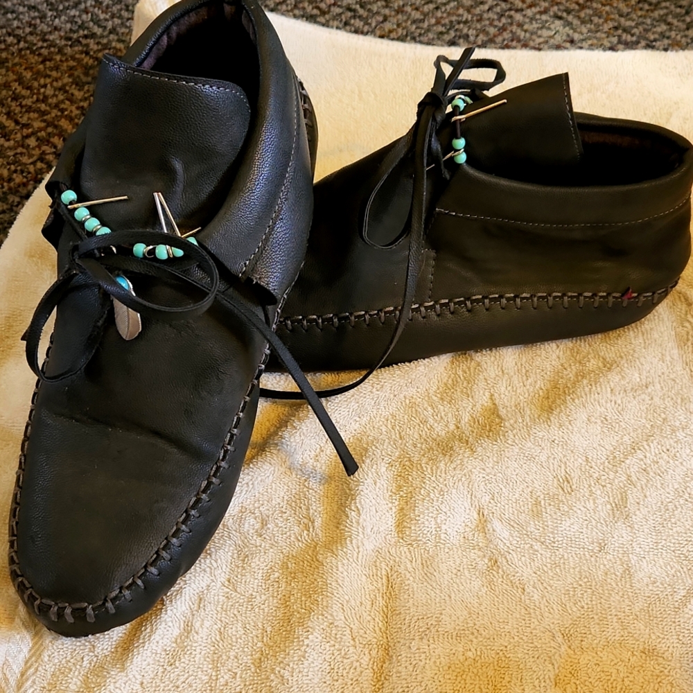 Pair of leather moccasin ankle boots size 11.